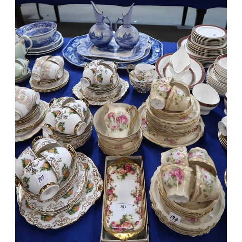 197 - A Royal Chelsea Golden Rose dish, a continental tea set and a Roslyn China tea set decorated with ro... 