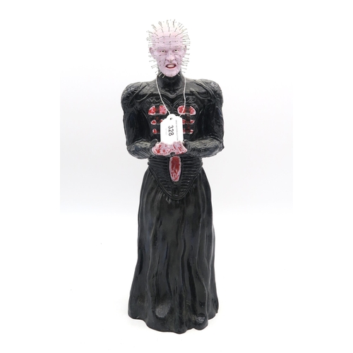 328 - A Pinhead figure, from the film franchise Hellraiser, marked to base 