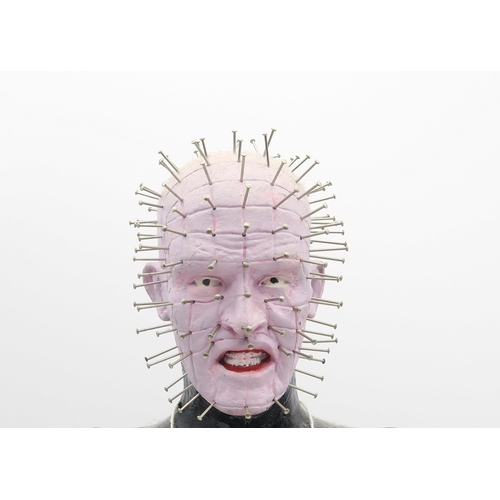 328 - A Pinhead figure, from the film franchise Hellraiser, marked to base 