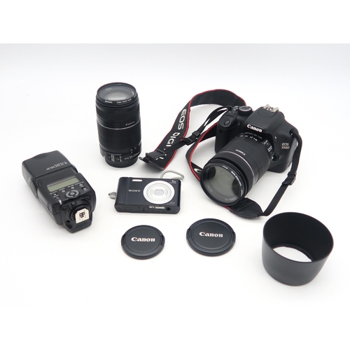 340 - A Pentax Super A camera fitted with an SMC Pentax-A 1:1.7 50mm lens, with additional 1:4 70-210mm Zo... 