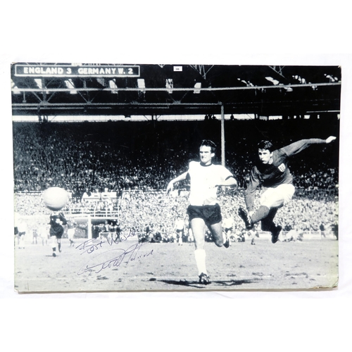 346 - Sir Geoff Hurst - a very large photographic print of Hurst striking the ball in the 1970 World Cup Q... 