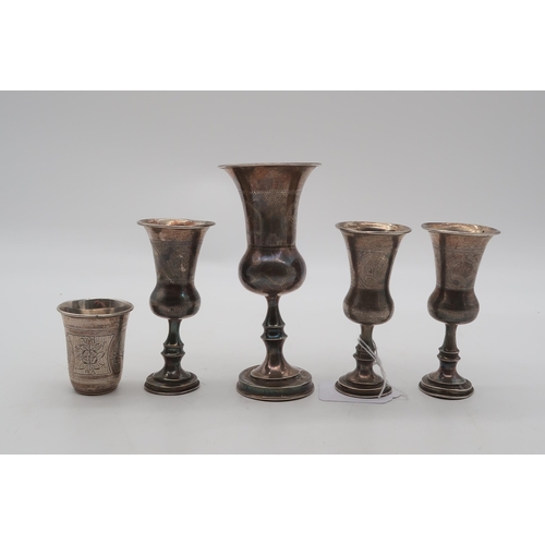 260A - A collection of silver Kuddish cups, including one bby J Zeving, London, three by Rozenzweig, T... 