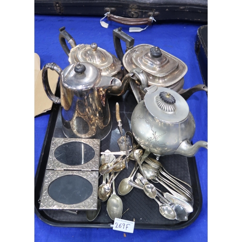 269F - A collection of EPNS including tea pots, loose cutlery, two silver cake knives, an EPNS double photo... 