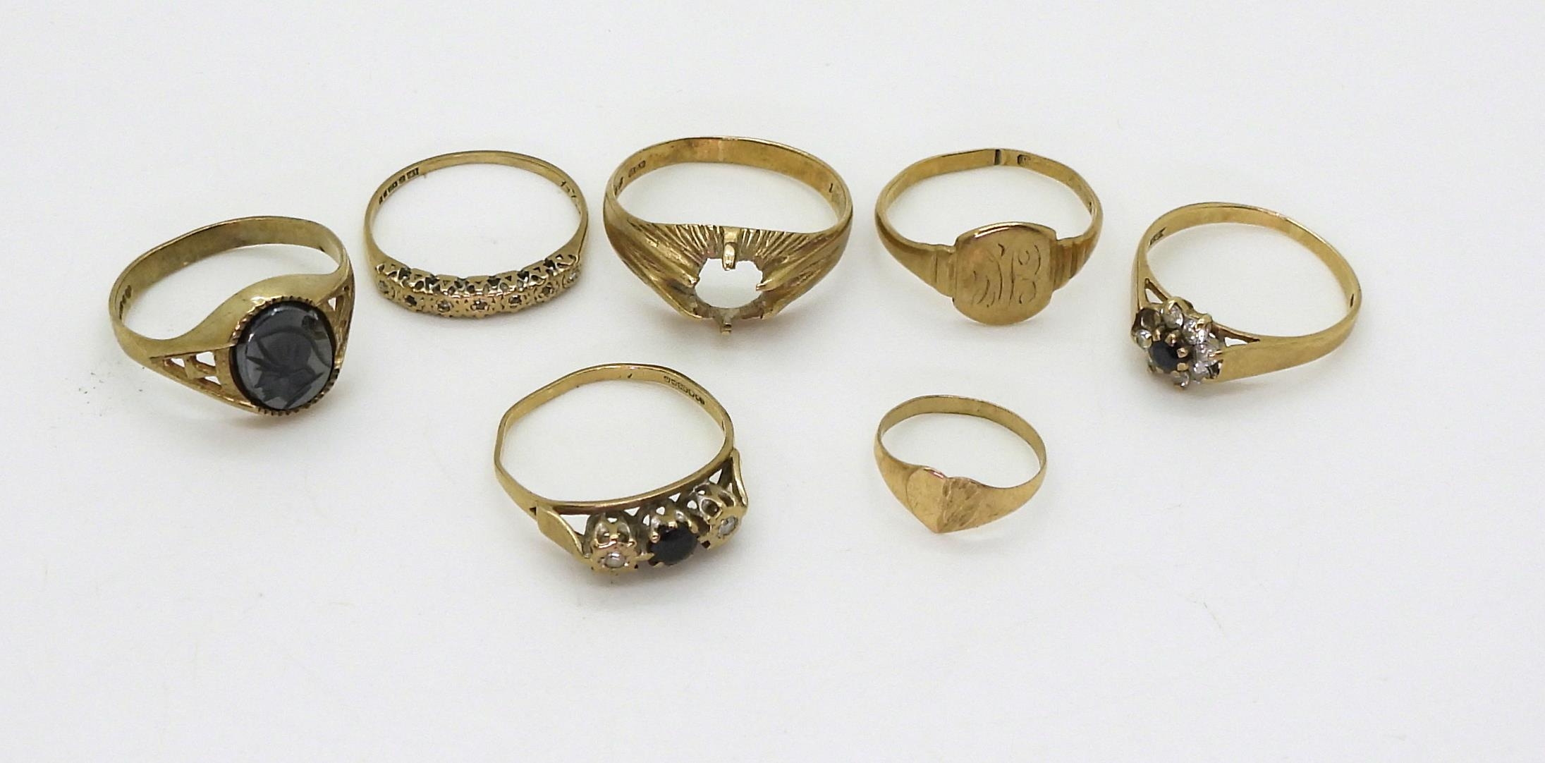 Seven 9ct gold rings to include a 9ct haematite centurion signet ring ...