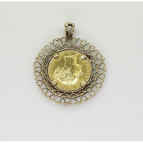 718 - An 1883 Victoria full gold sovereign in a 9ct gold pendant mount weight together 12.4gms