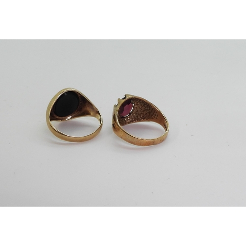 741 - A 9ct gold star set garnet ring size M1/2, together with an onyx signet ring size M1/2, weight 6.3gm... 