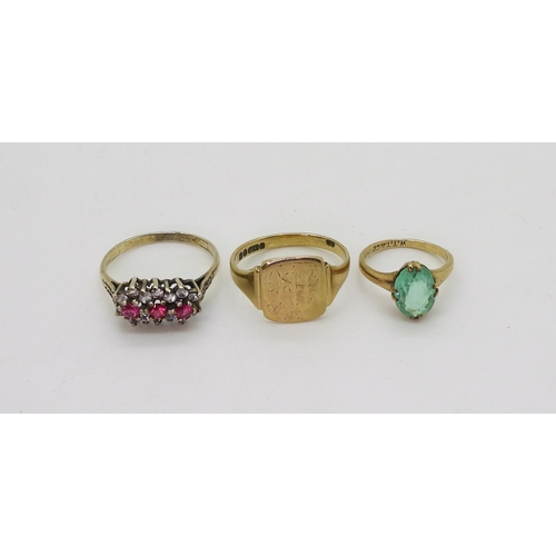 751 - A 9ct gold signet ring size T, and a green glass 9ct gold  ring, size I, weight together 5.5gms... 