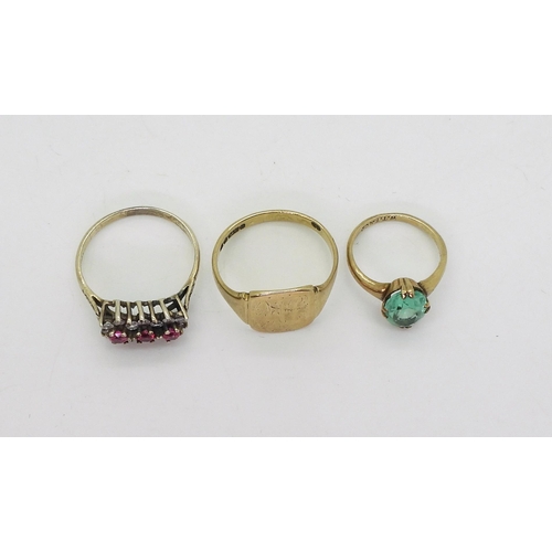 751 - A 9ct gold signet ring size T, and a green glass 9ct gold  ring, size I, weight together 5.5gms... 