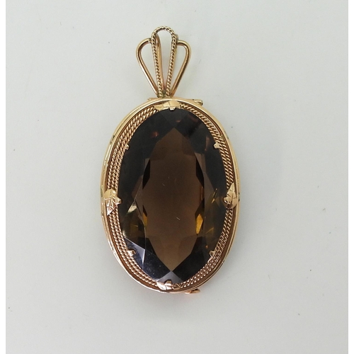 760 - A 14k gold large smoky quartz pendant brooch bears Israel's Lyre hallmark, length with bail 5.5cm, w... 