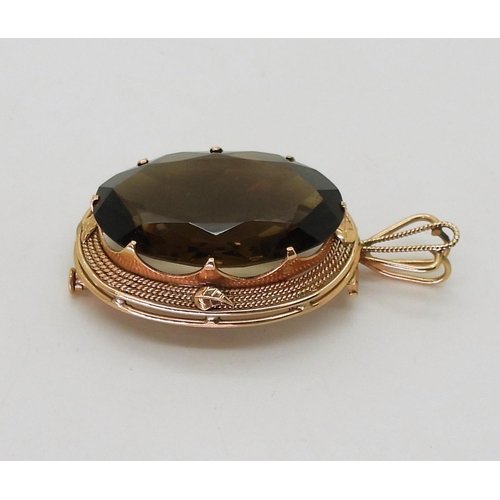 760 - A 14k gold large smoky quartz pendant brooch bears Israel's Lyre hallmark, length with bail 5.5cm, w... 