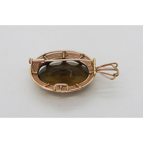 760 - A 14k gold large smoky quartz pendant brooch bears Israel's Lyre hallmark, length with bail 5.5cm, w... 