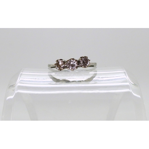 767 - A three-stone diamond ring, mounted in 18ct white gold, size R, set with estimated approx 0.50cts br... 