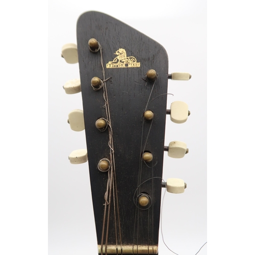 283 - A banjo mandolin 17 frets and marked British Made to the headstock with original case and a tin of p... 