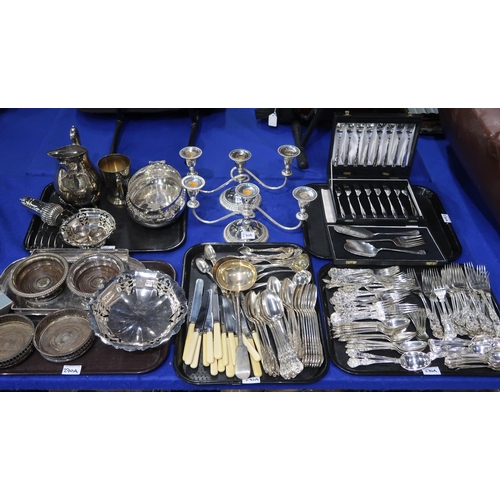 270A - A part silver plated cutlery set together with two silver plated candelabra, wine coasters, cased fl... 