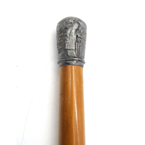 357 - A Malacca walking cane, with embossed Chinese white metal pommel, approximately 90cm in length