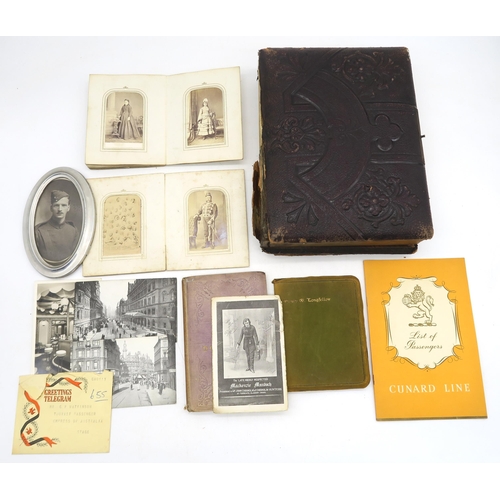 360 - An embossed leather photograph album, with additional loose photographs to include an oval-framed po... 