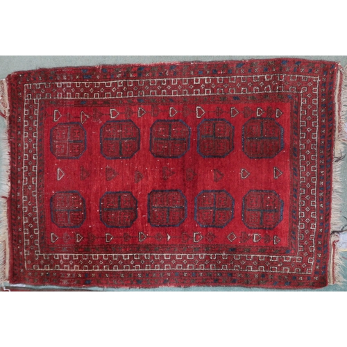 61 - A lot consisting red ground Bokhara rug, 133cm long x 92cm wide and a smaller red ground Bokhara sty... 