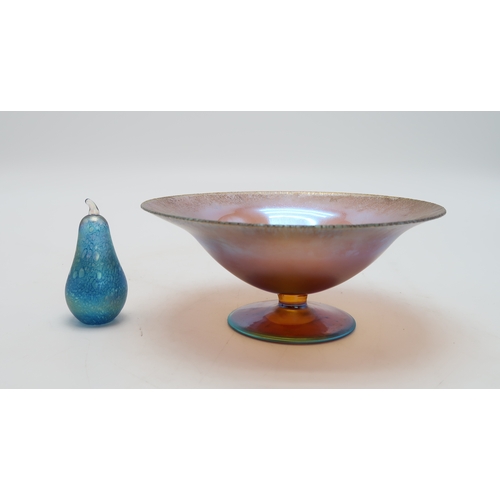 2230 - A WMF MYRA GLASS BOWLof open form with circular foot, in amber glass with blue iridescence, together... 