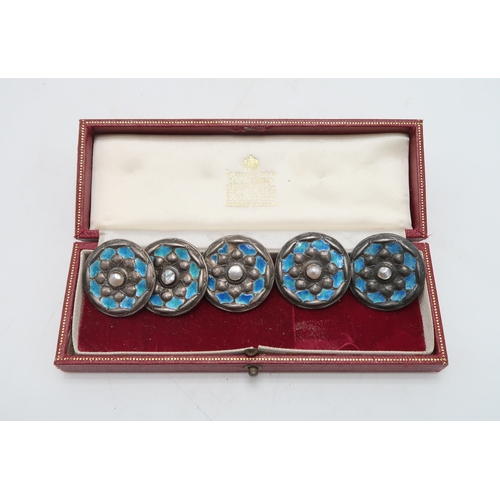 2443 - LIBERTY& CO;A set of five Cymric silver & enamel buttons, Birmingham 1901, decorated turquoi... 