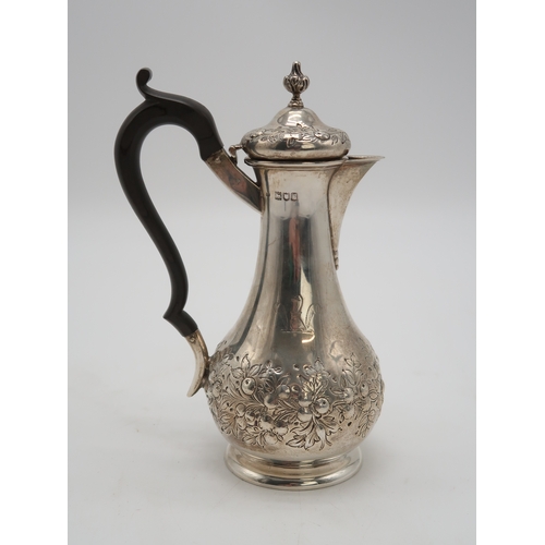 2445 - AN EDWARDIAN SILVER COFFEE POTby Charles Edwards, London 1902, of slender baluster form, with engrav... 