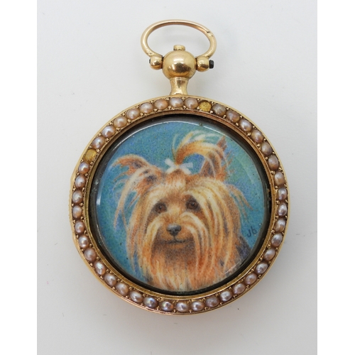 2803 - A YORKSHIRE TERRIER PORTRAIT MINIATUREpainted on ivory and mounted inside a yellow metal fob watch c... 