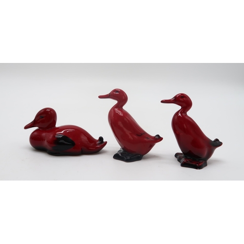 2152 - A GROUP OF ROYAL DOULTON FLAMBE ANIMALS AND BIRDSincluding a duck 16cm tall, three smaller examples,... 