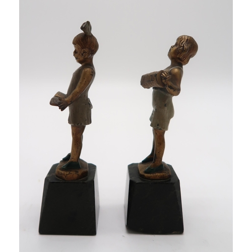 2158 - J.H. LAND - A pair of gilt bronze and enamel Art Deco figures, modelled as boy with accordion and gi... 