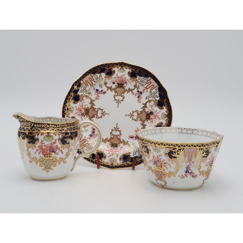 2162 - A ROYAL CROWN DERBY TEASETin 3788 Imari pattern, comprising twelve tea cups, saucers, plates, cake p... 