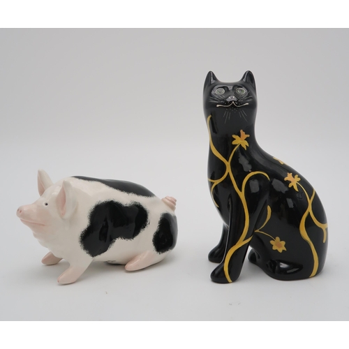 2174 - A COLLECTION OF GRISELDA HILL POTTERYincluding a limited edition black cat painted with daffodils, n... 