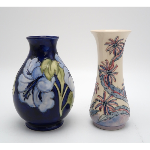 2179 - A MOORCROFT COLLECTORS CLUB VASEin daisy pattern designed by Sally Tuffin circa 1988, 21cm high, tog... 