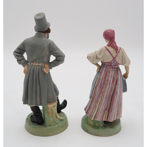 2193 - A PAIR OF RUSSIAN BISQUE FIGURESmodelled as a man and woman dancing, in the style of Gardner, impres... 