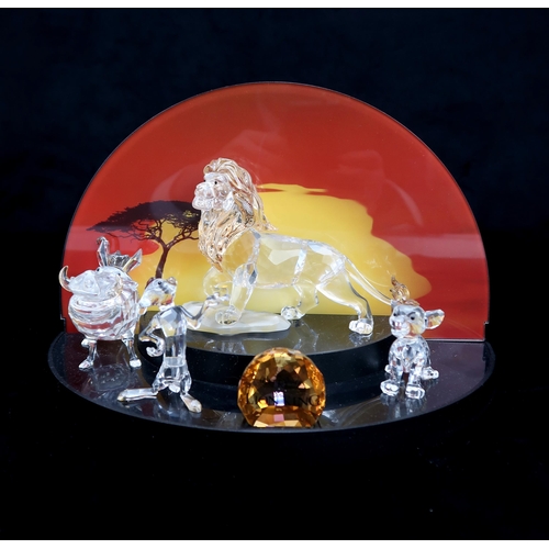 2202 - FOUR SWAROVSKI CRYSTAL WALT DISNEY CHARACTERS FROM THE LION KINGincluding Mufasa, Simba, Pumba, and ... 