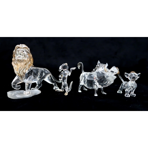 2202 - FOUR SWAROVSKI CRYSTAL WALT DISNEY CHARACTERS FROM THE LION KINGincluding Mufasa, Simba, Pumba, and ... 