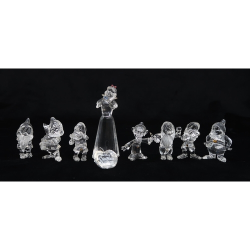 2203 - SWAROVSKI CRYSTAL WALT DISNEY GROUP OF SNOW WHITE AND THE SEVEN DWARVEStogether with apple shaped pl... 