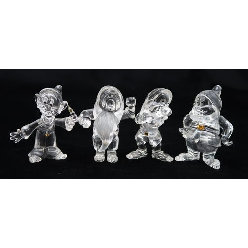 2203 - SWAROVSKI CRYSTAL WALT DISNEY GROUP OF SNOW WHITE AND THE SEVEN DWARVEStogether with apple shaped pl... 