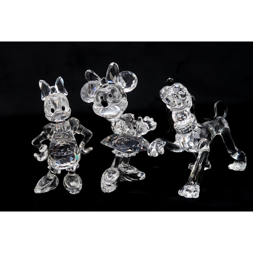 2208 - SEVEN SWAROVSKI CRYSTAL WALT DISNEY CHARACTERSincluding Mickey Mouse, Minnie Mouse, Donald Duck, Dai... 