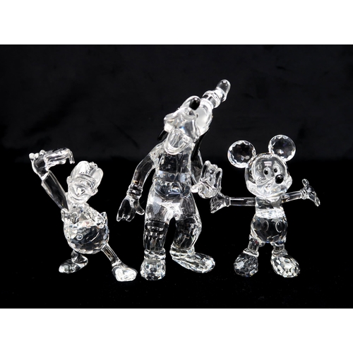 2208 - SEVEN SWAROVSKI CRYSTAL WALT DISNEY CHARACTERSincluding Mickey Mouse, Minnie Mouse, Donald Duck, Dai... 