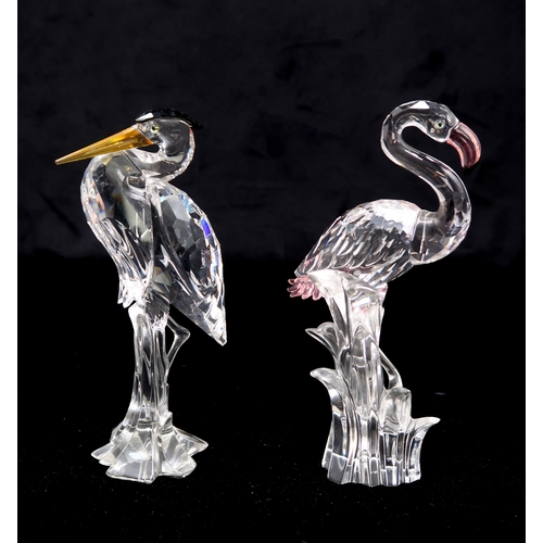 2216 - A COLLECTION OF SWAROVSKI CRYSTAL FIGURESincluding two Feathered Beauty examples of a heron and a fl... 