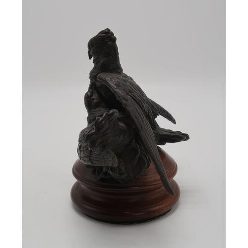 2220 - A BRONZE GROUP OF A PAIR OF PIGEONS OR DOVESprobably French, 21cm high on wooden base... 