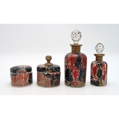 2229 - A SET OF FOUR ART DECO FRENCH GLASS TOILET JARS AND BOTTLESpainted in red and black enamel with gilt... 