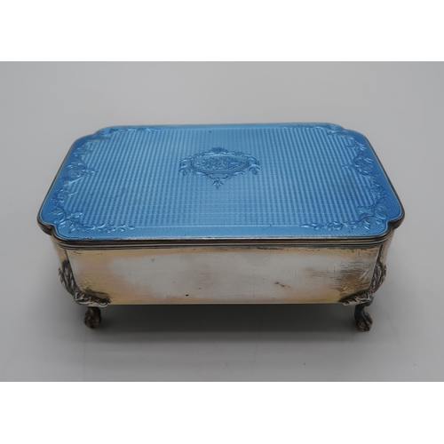 2404 - A GEORGE V SILVER GUILLOCHE ENAMEL JEWELLERY BOXby William Comyns, London 1927, of shaped rectangula... 