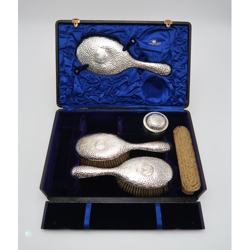 2408 - A CASED EDWARDIAN FIVE PIECE SILVER DRESSING TABLE SETby William Comyns, London 1902, comprising two... 