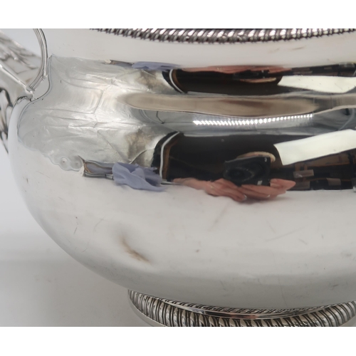 2410 - A GEORGE III SILVER TEAPOTby Robert Hennell I & Samuel Hennell, London 1807, of squat form, with... 