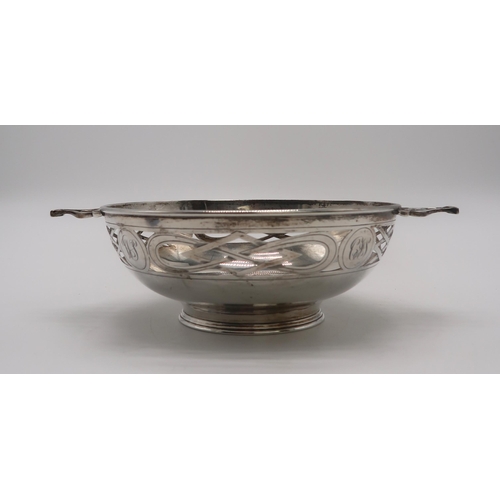 2411 - A GEORGE V SILVER QUAICH-FORM BOWLby Alexander Scott, Sheffield 1921, with lattice-type openwork to ... 