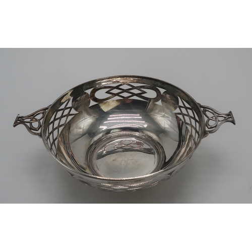 2411 - A GEORGE V SILVER QUAICH-FORM BOWLby Alexander Scott, Sheffield 1921, with lattice-type openwork to ... 