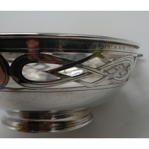 2411 - A GEORGE V SILVER QUAICH-FORM BOWLby Alexander Scott, Sheffield 1921, with lattice-type openwork to ... 