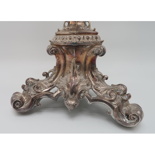 2420 - AN IMPRESSIVE SILVER-PLATED VICTORIAN FOUR BRANCH CANDELABRUM CENTREPIECEthe knopped baluster stem f... 