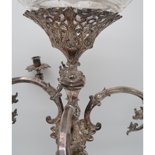 2420 - AN IMPRESSIVE SILVER-PLATED VICTORIAN FOUR BRANCH CANDELABRUM CENTREPIECEthe knopped baluster stem f... 