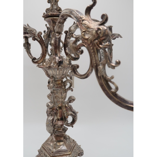 2420 - AN IMPRESSIVE SILVER-PLATED VICTORIAN FOUR BRANCH CANDELABRUM CENTREPIECEthe knopped baluster stem f... 