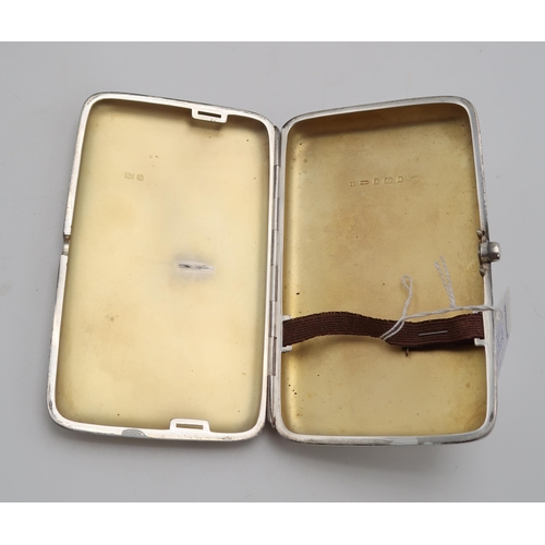 2422 - AN EDWARDIAN SILVER CIGAR CASEby Deakin & Francis, Birmingham 1903, of shaped rectangular form, ... 